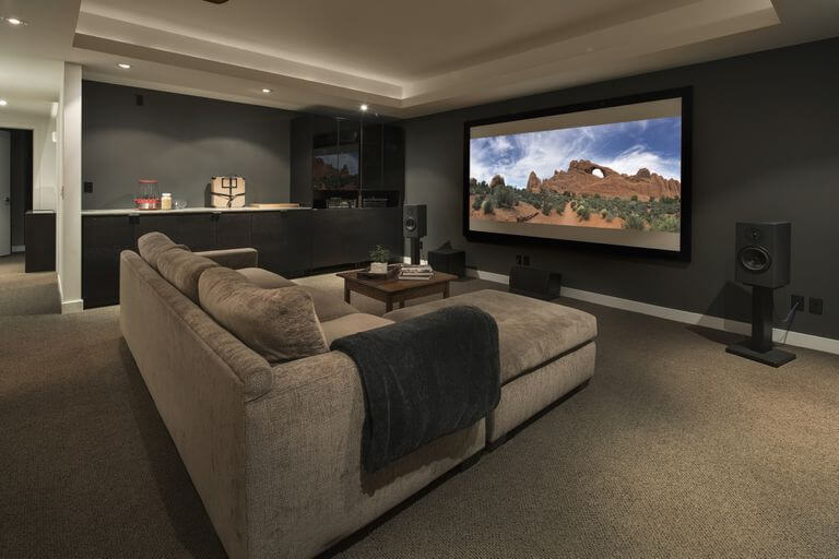 movie-playing-on-projection-screen-in-home-theater-915093896-5bdb7eb0c9e77c0026d2970f-2